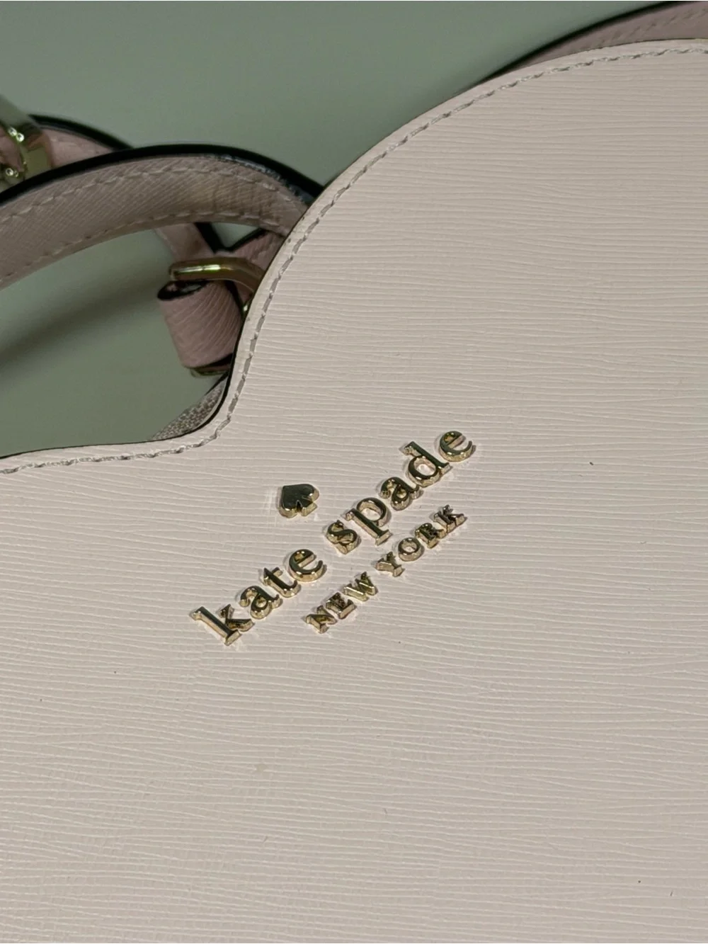 kate spade pale pink heart-shaped mini crossbody